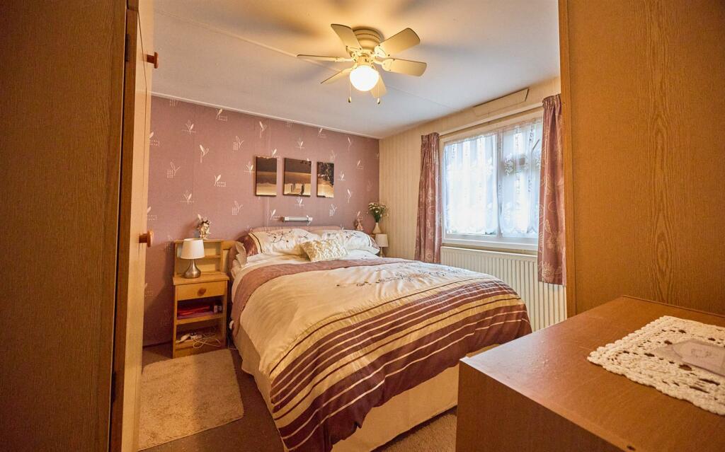 BEDROOM ONE TO REAR