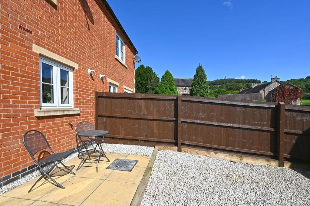 Rear Garden - patio and views to Barrel Edge.jpg
