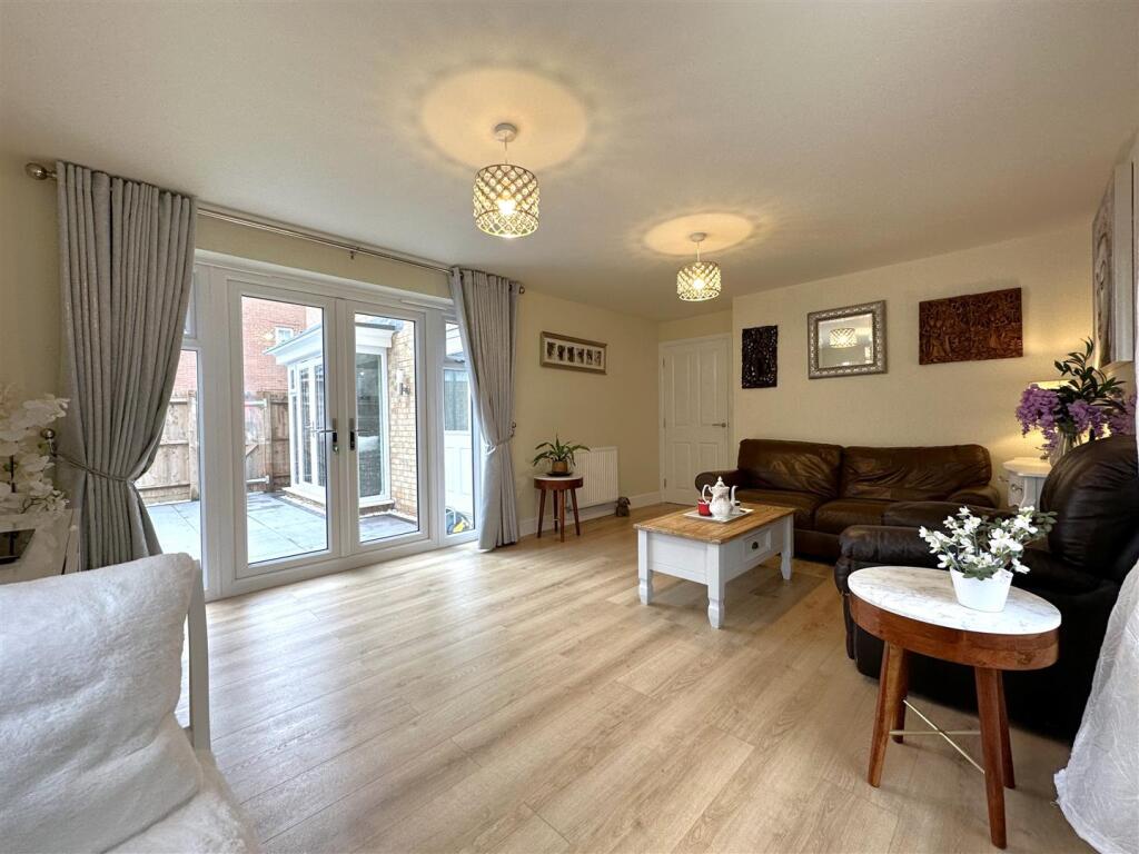 Living Room With French Doors 144