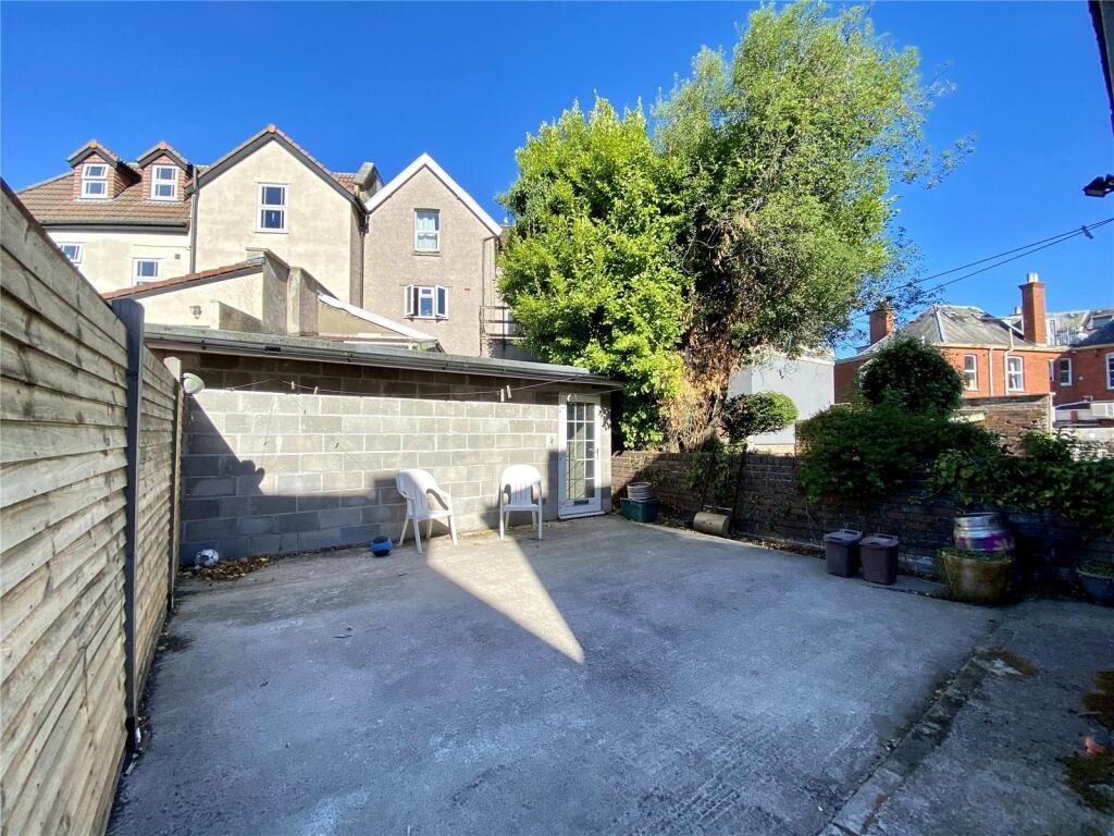 A well-maintained garden area with ample sunlig...