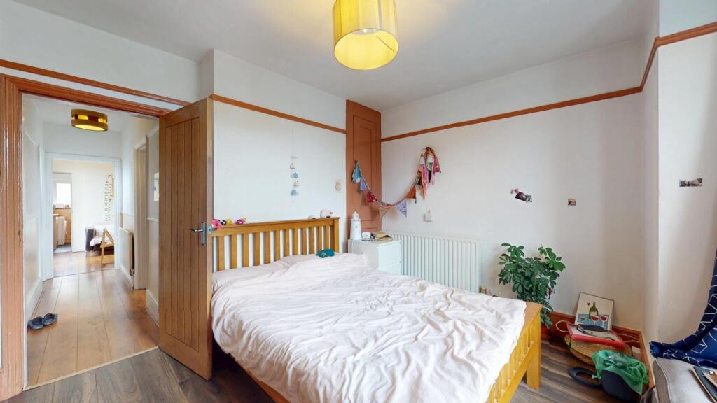 Bright and inviting double bedroom featuring a ...