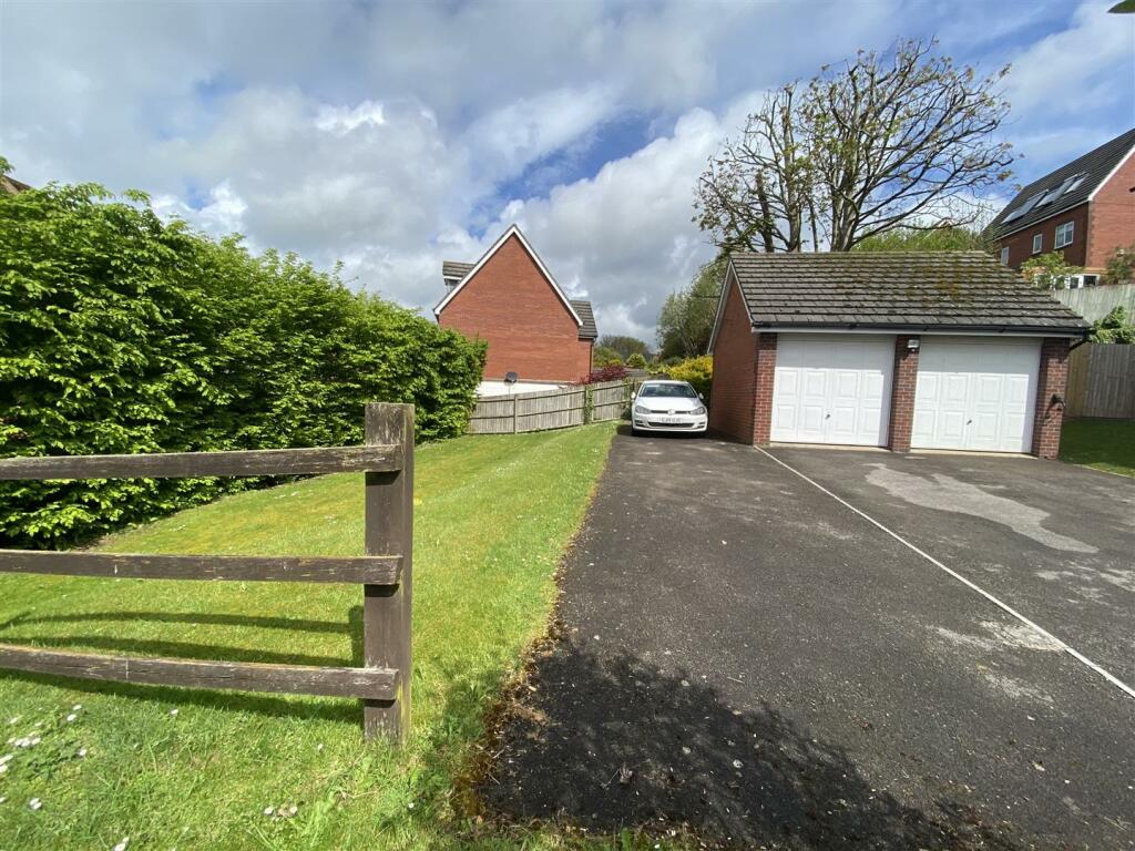 DRIVEWAY, PARKING AND GARAGE