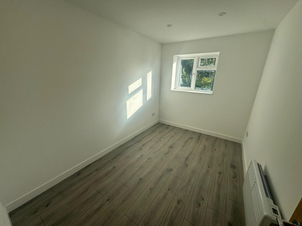 Bright room with a clean, minimalistic design f...