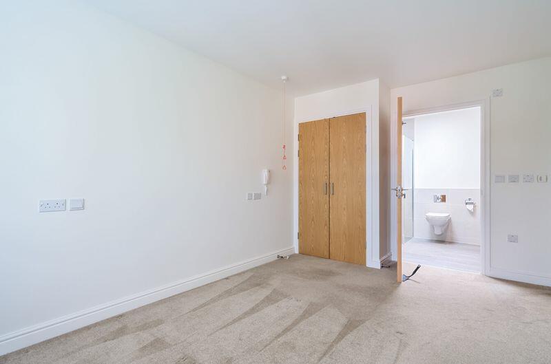 Bedroom with fitted wardrobe and ensuite