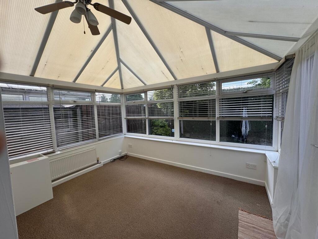 SITTING ROOM KITCHEN AND CONSERVATORY