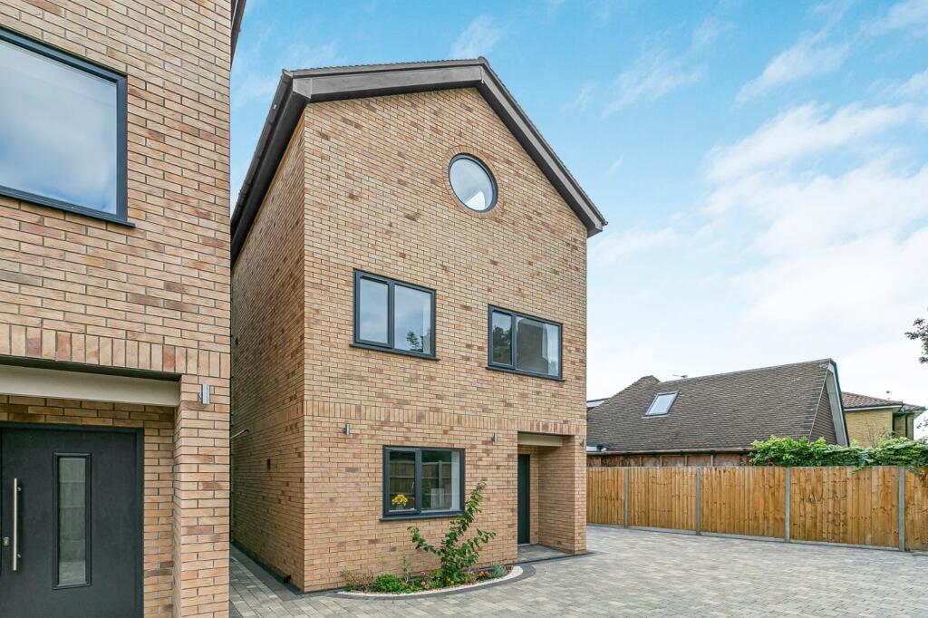 property in Grand Drive, 
Raynes Park, SW20