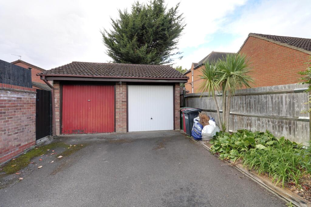 garage with parking to front