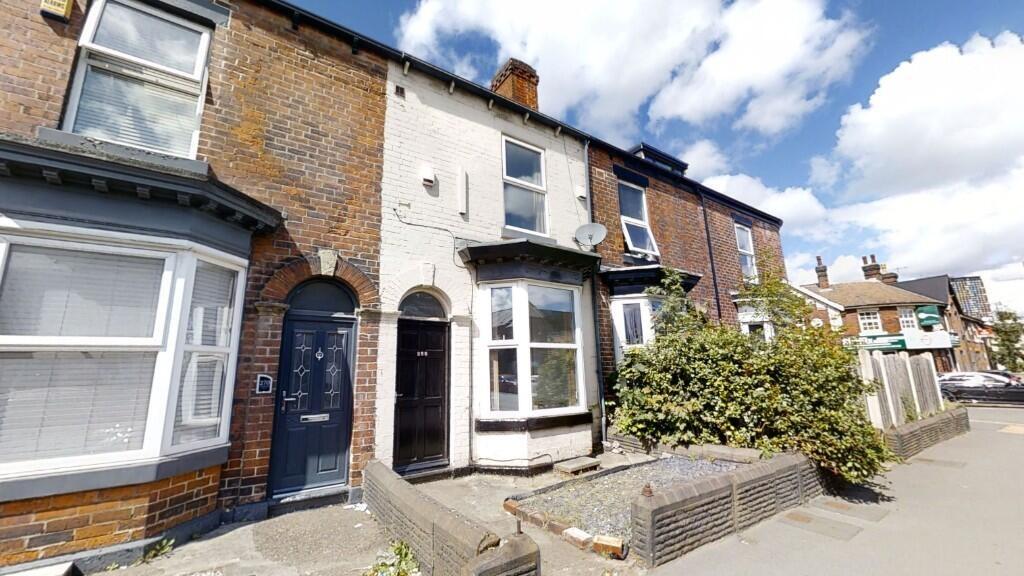 A charming terraced house with traditional bric...