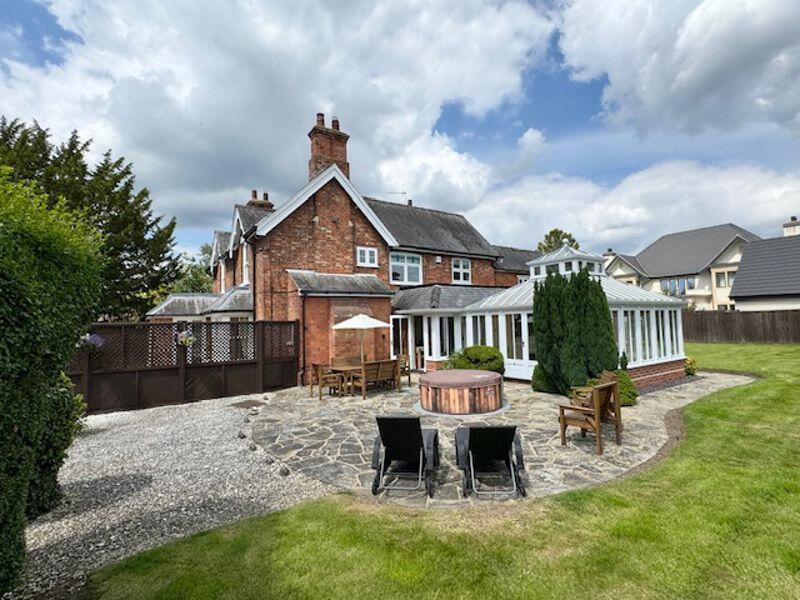 Opposite side of house and rear and s...