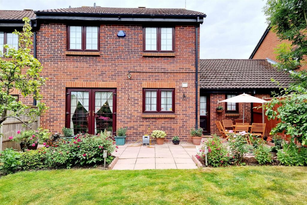 REAR ELEVATION OF PROPERTY:
