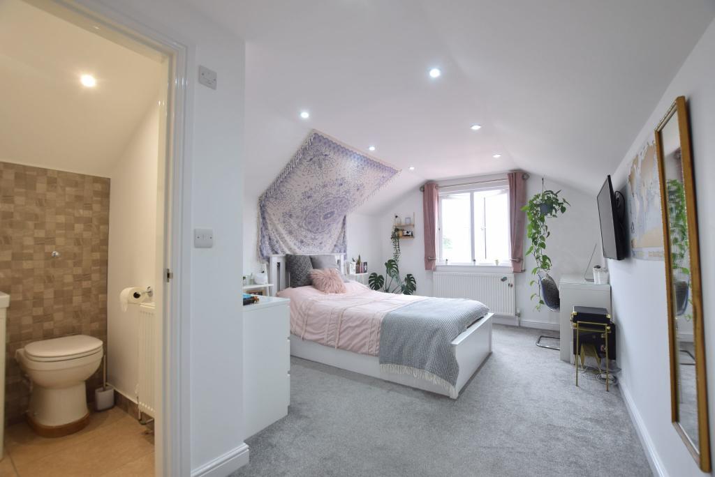 FIRST FLOOR: BEDROOM/GUEST SUITE