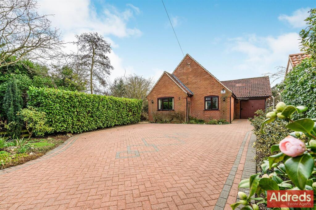 front aspect and driveway