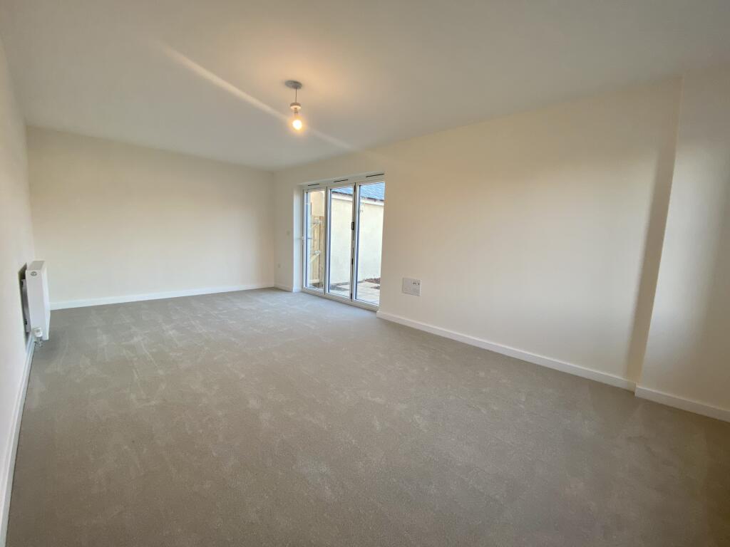 Spacious Sitting Room with Bi-Folds on to Walled Garden