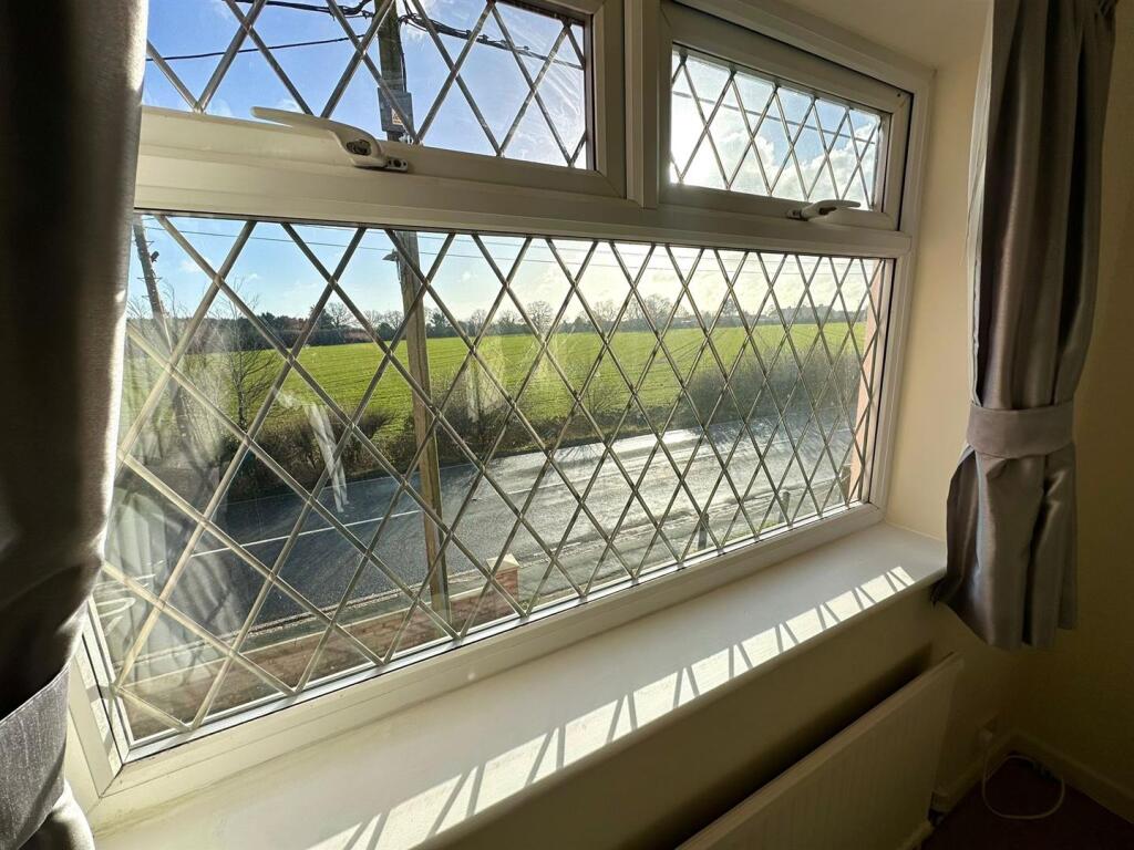 FARMLAND VIEWS FROM BEDROOM ONE