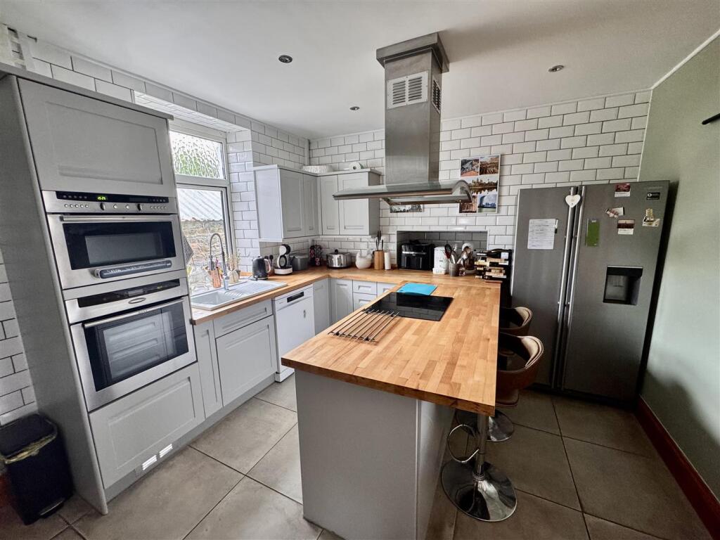 Kitchen with utility area