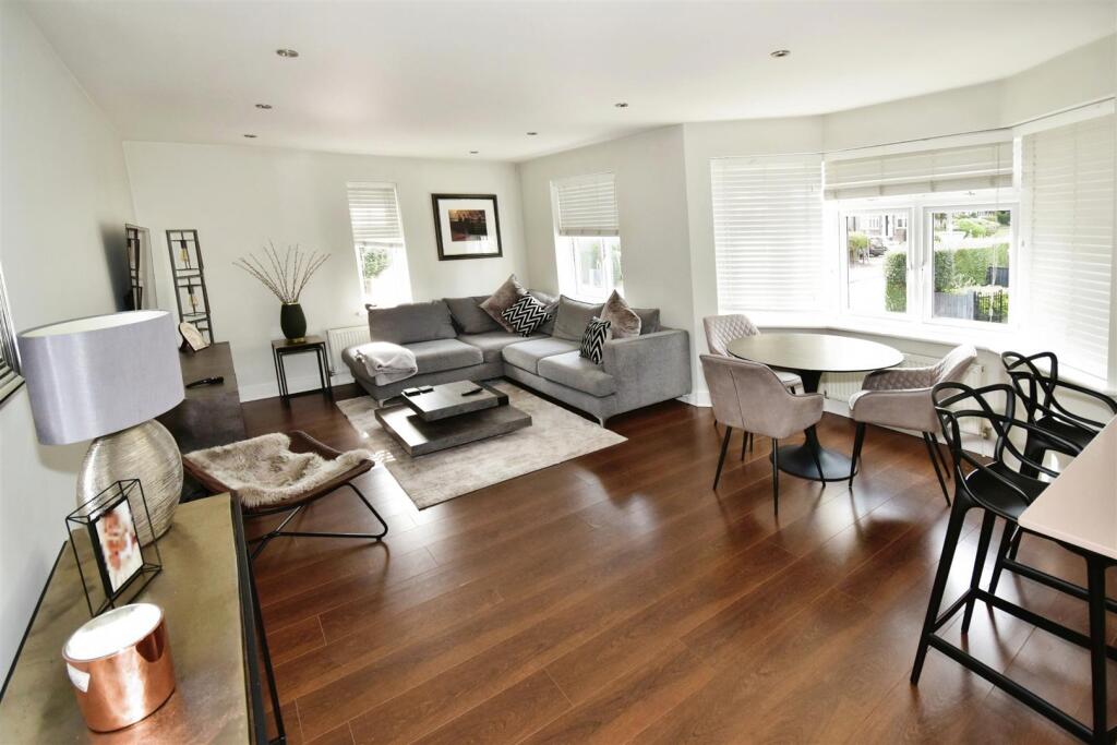 LIVING/DINING AND KITCHEN AREA