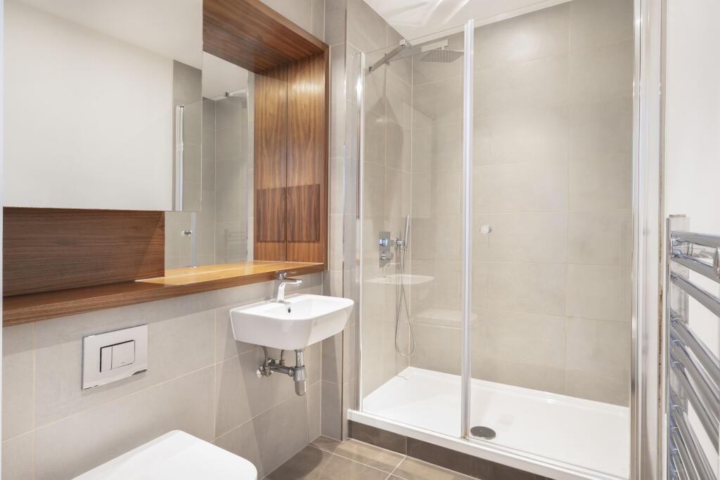 Experience comfort and elegance in this contemporary bathroom.