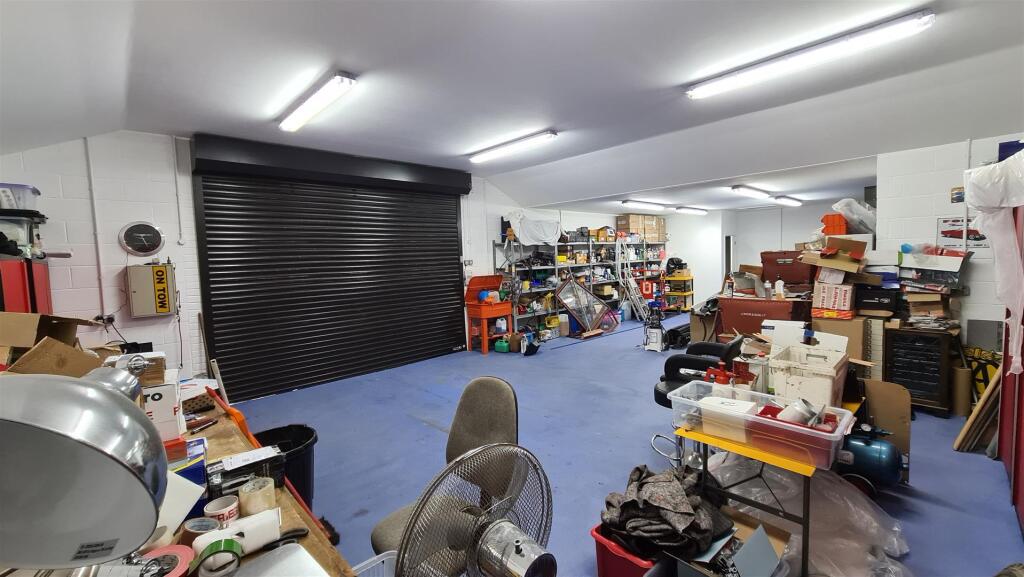 First Integrated Outbuilding / Garaging