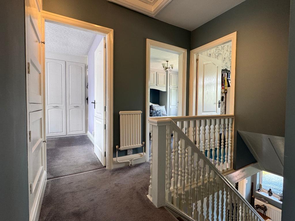 Landing to 4 bedrooms