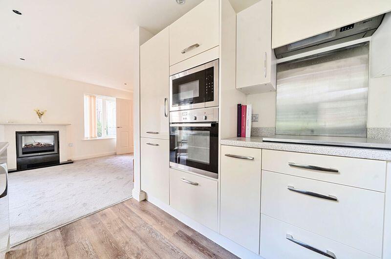 Kitchen with built-in appliances