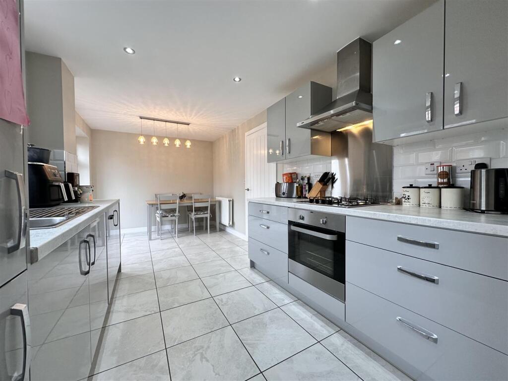 Dining Kitchen With Integrated Appliances 207