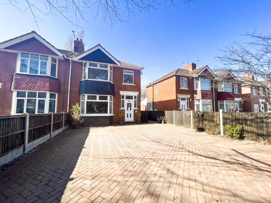 Charming Three-Bedroom Family Home with Modern Re