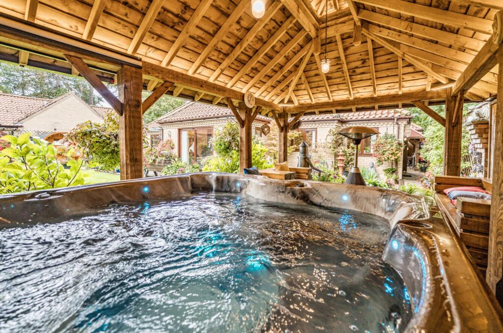 Covered hot tub house