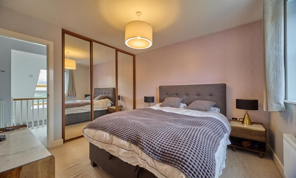 FRONT BEDROOM ONE