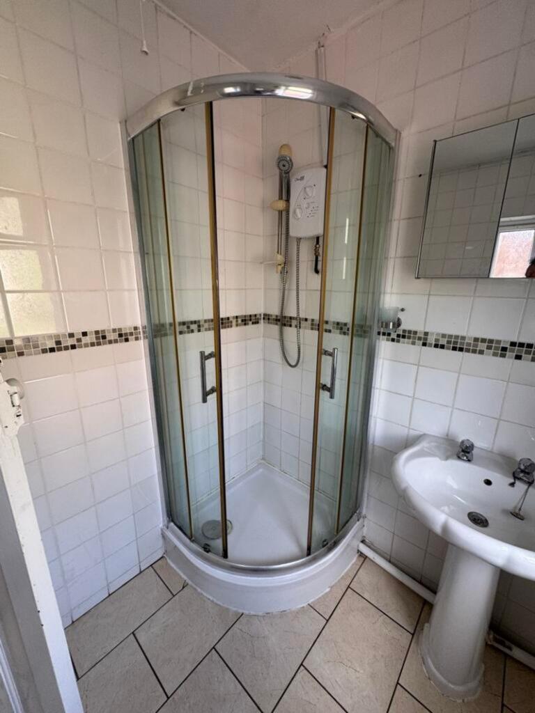 A clean and modern bathroom featuring a stylish...