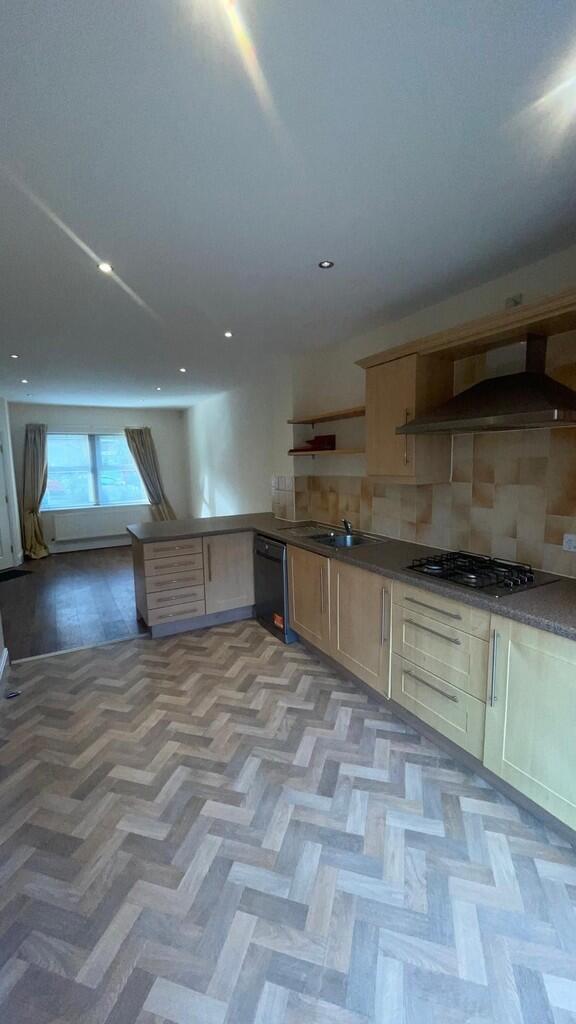 kitchen looking o...