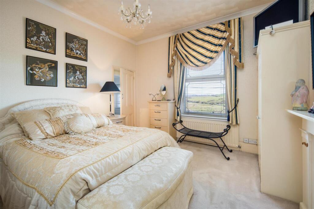 One of 5-6 Bedrooms