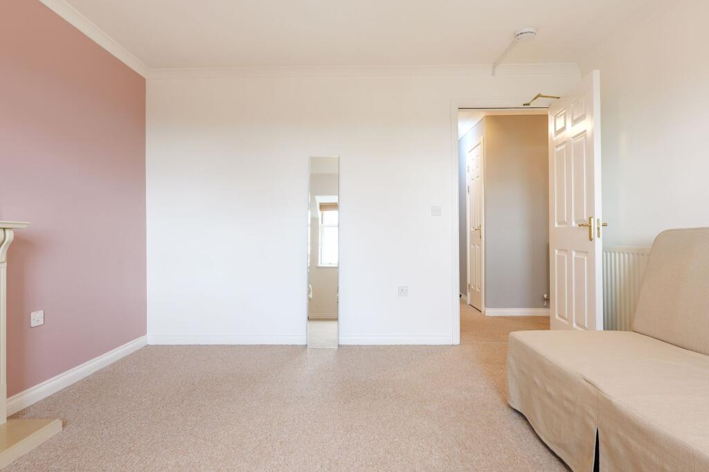 Expansive Lounge with ample room for freestanding furniture