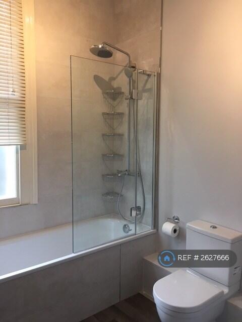  2nd Floor Landing. Bathroom, Shower, Loo, Sink.