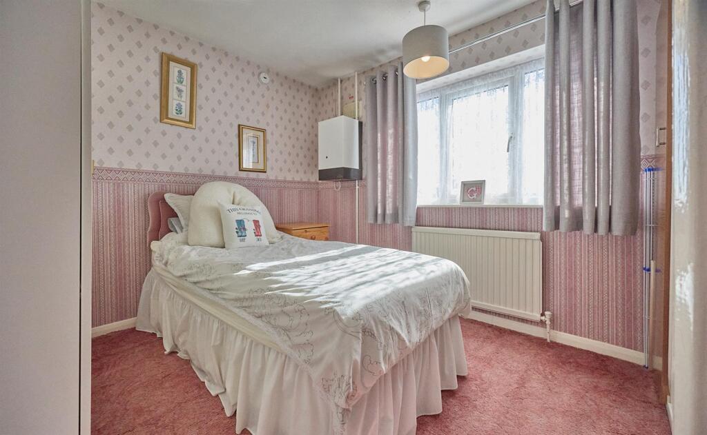 BEDROOM TWO TO REAR