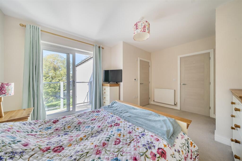 Principal Bedroom with Balcony to garden