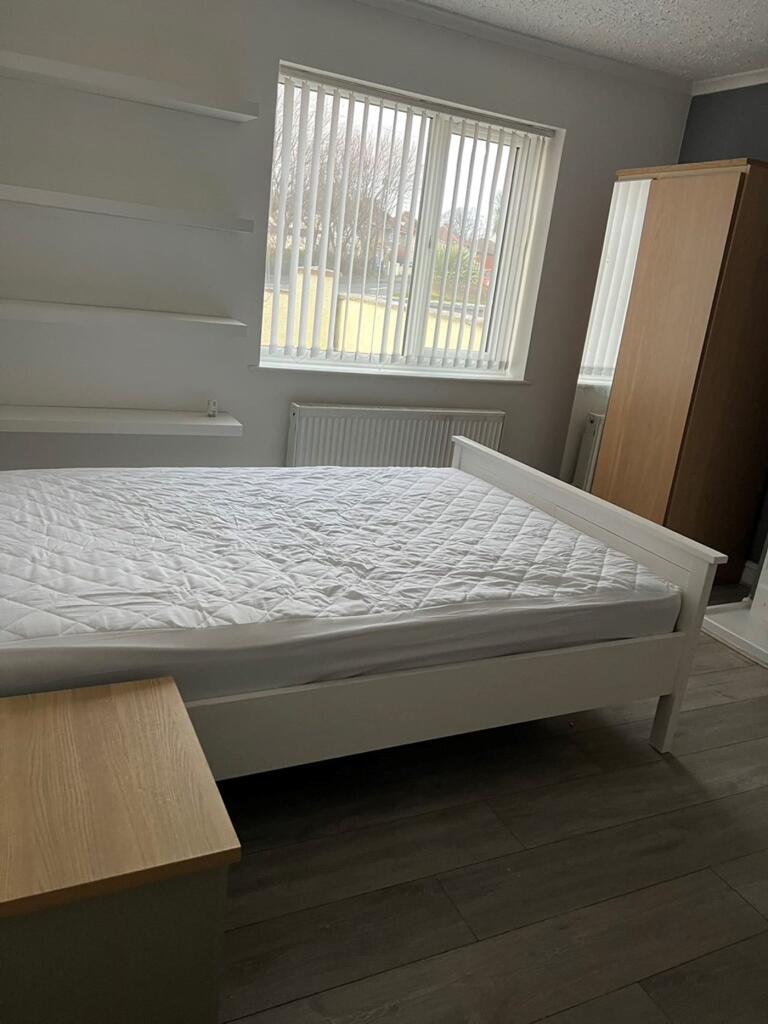 A bright and spacious double bedroom, perfect f...