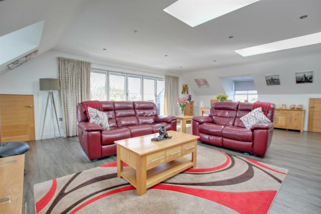 OPEN PLAN KITCHEN AND LIVING AREA