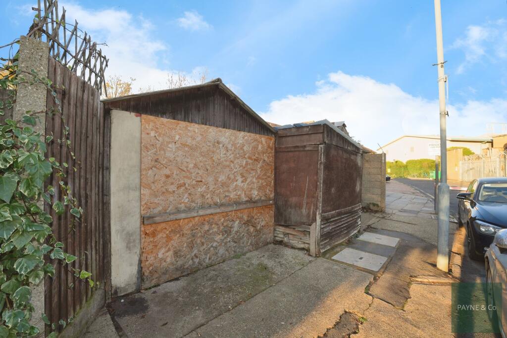 Three outbuildings/garages