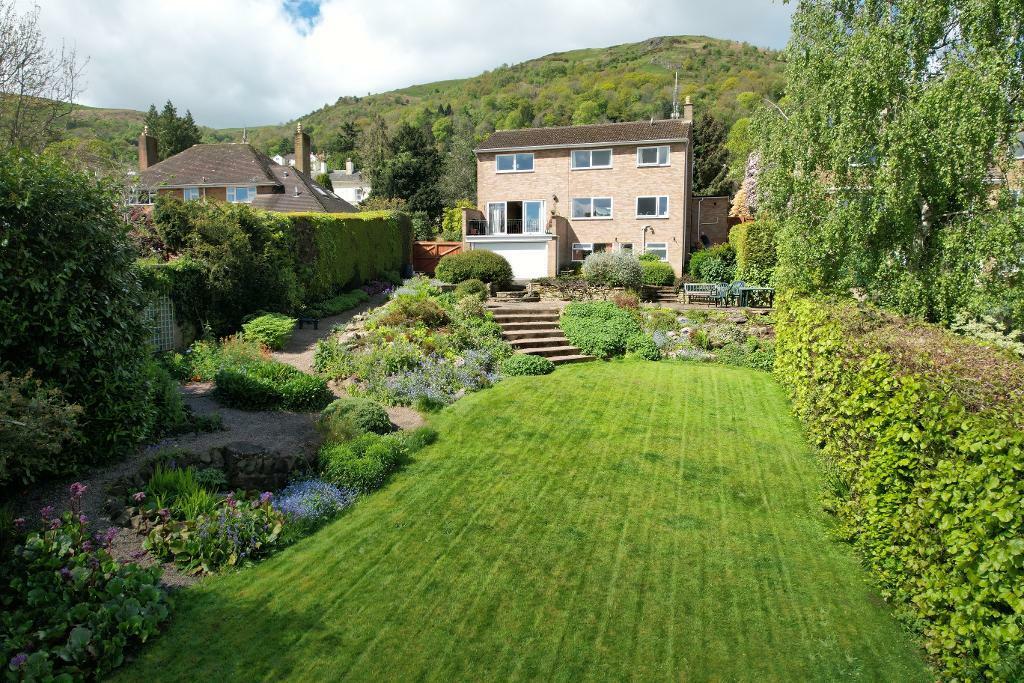 Garden, rockeries and rear of house