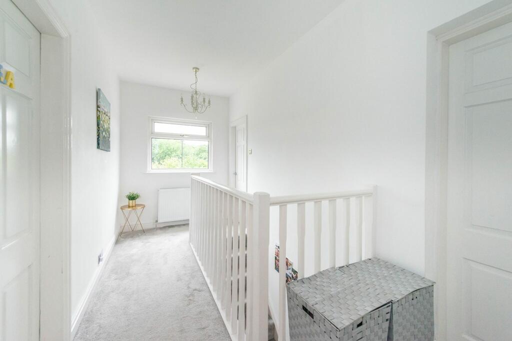 ENTRANCE HALLWAY AND LANDING