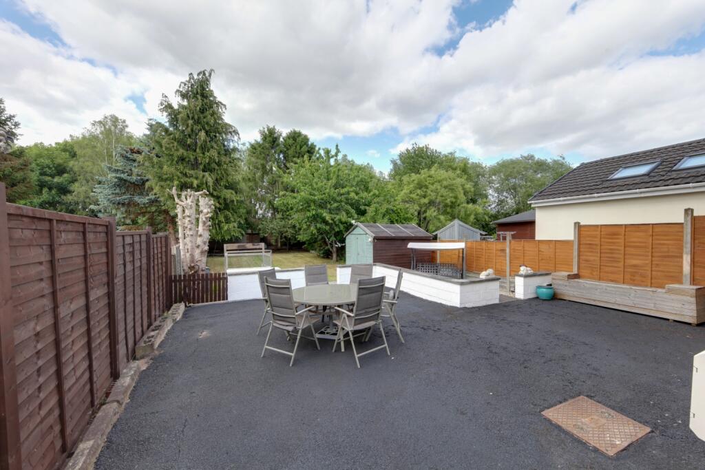 long view of patio and garden