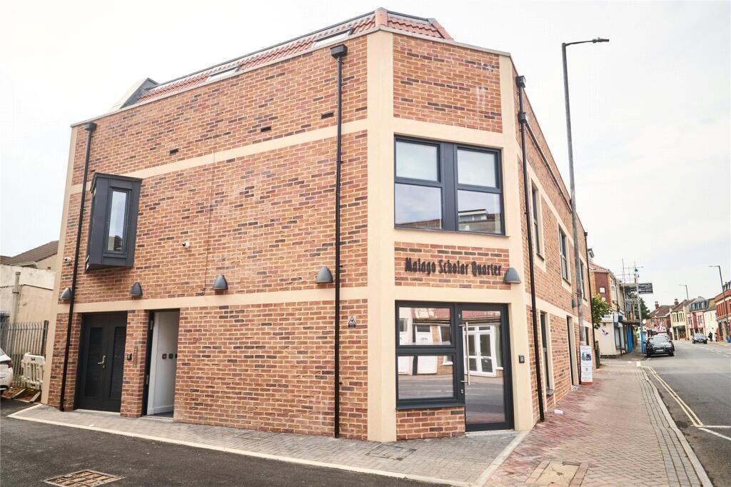 Modern brick-built corner property with large w...