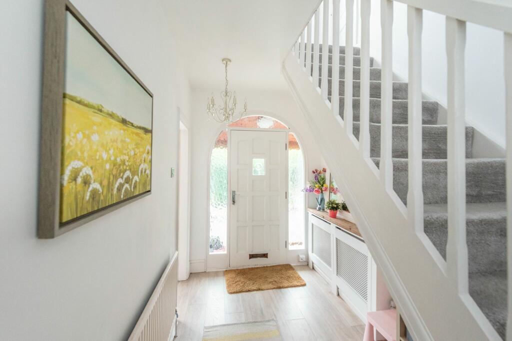 ENTRANCE HALLWAY AND LANDING