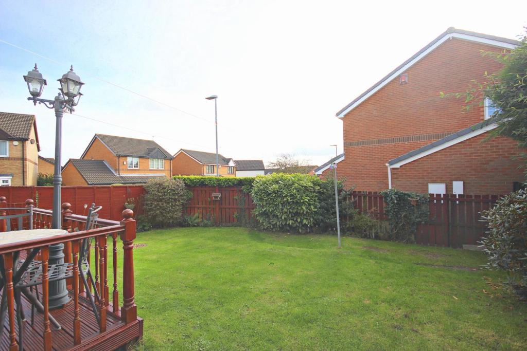 Enclosed Rear Garden and Patio Area