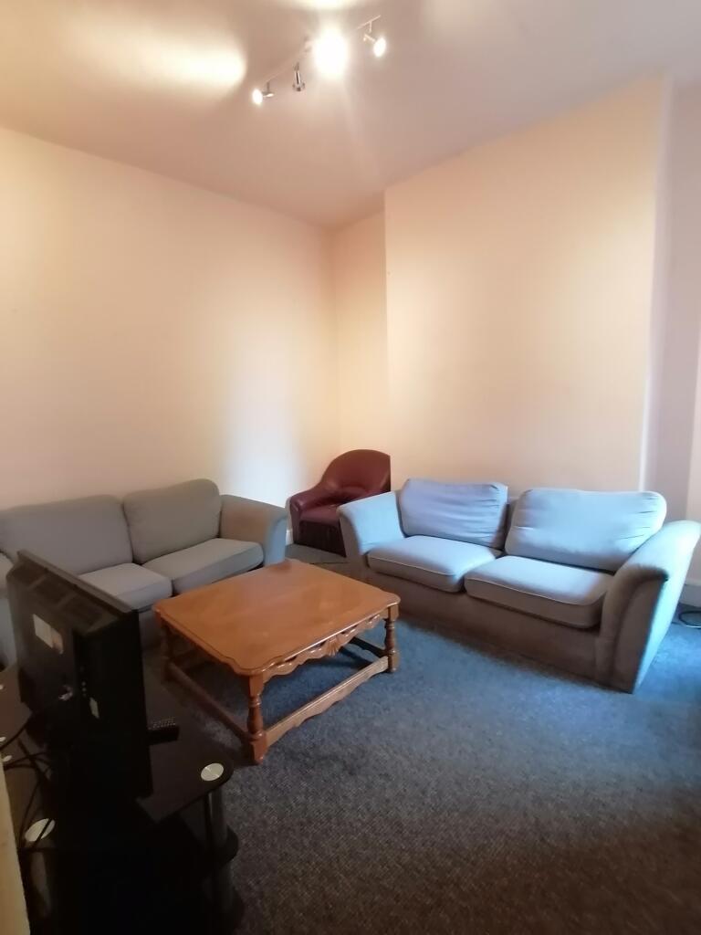 A spacious and inviting large modern living roo...