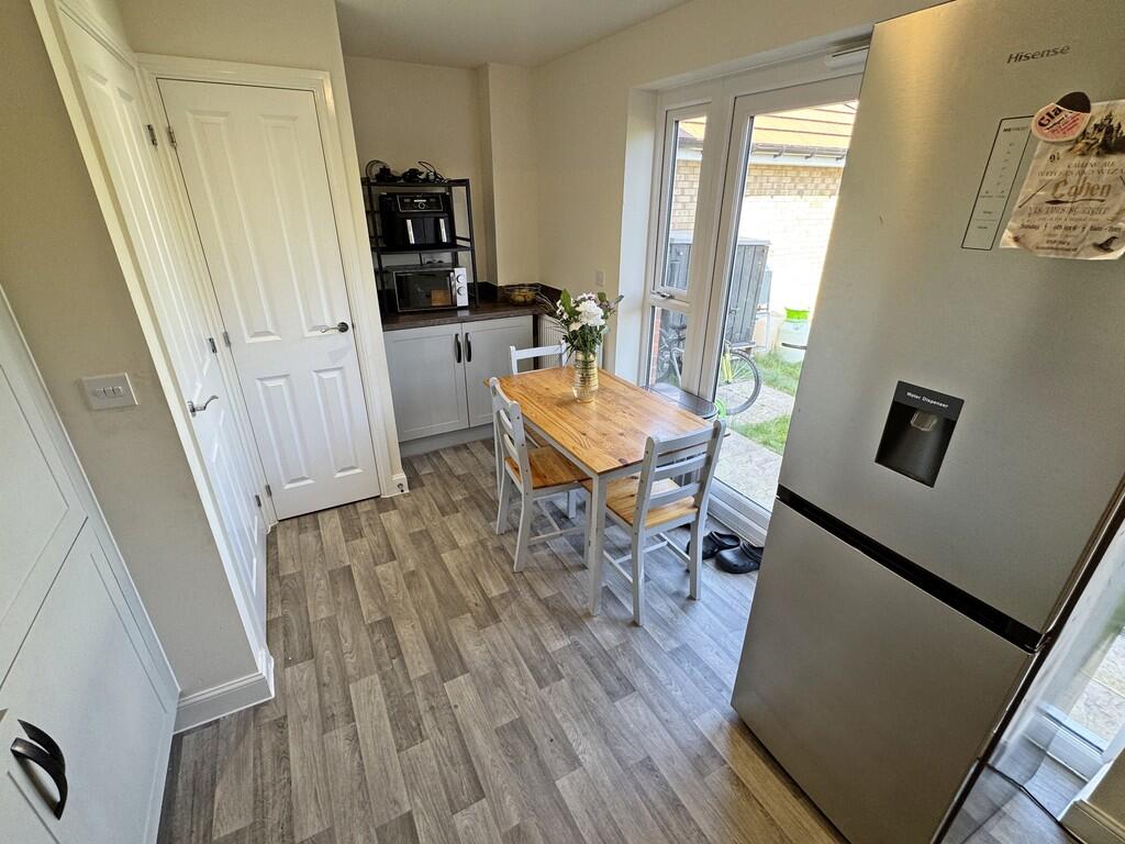Kitchen to dining...