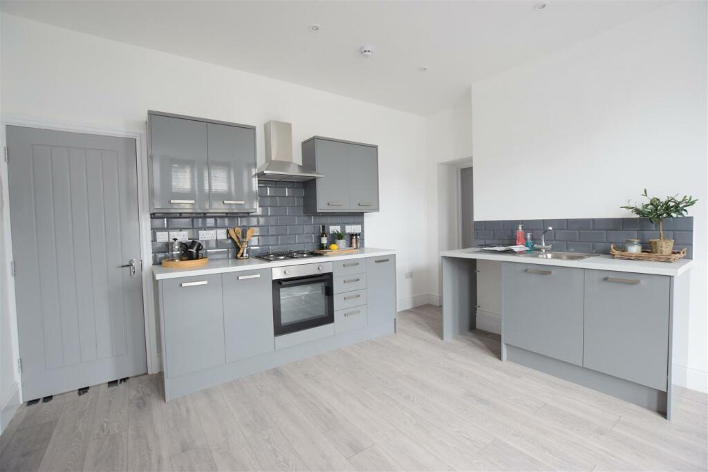Apt 6 Living Kitchen (2).JPG