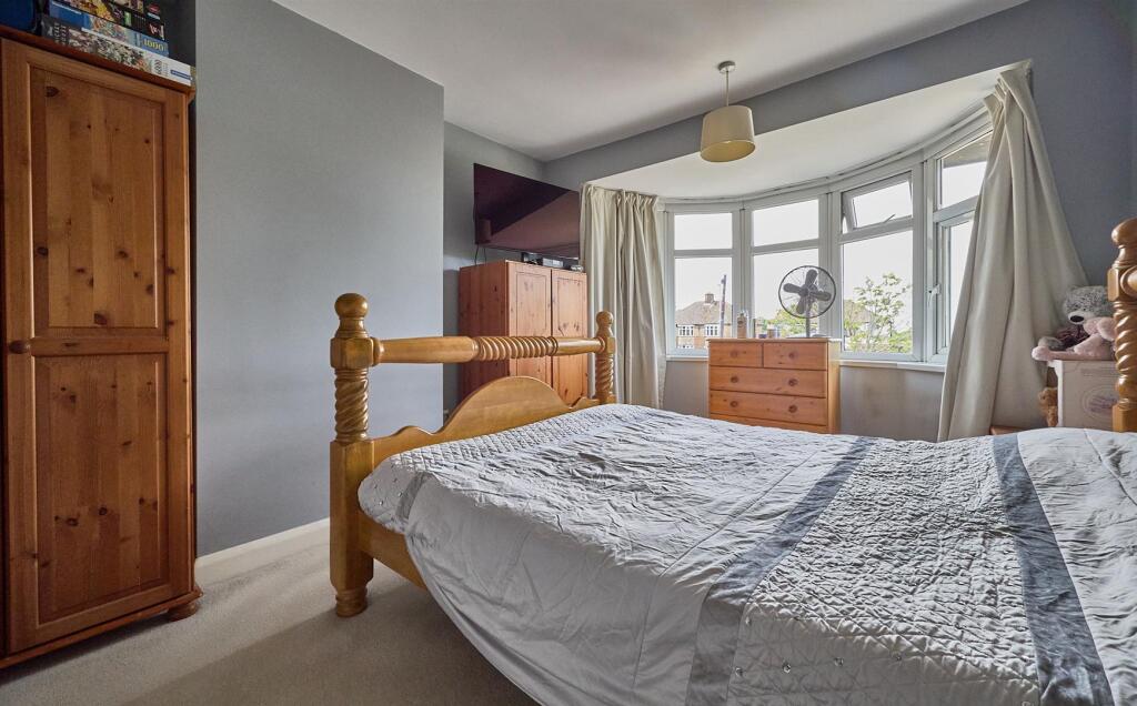 BEDROOM ONE TO FRONT