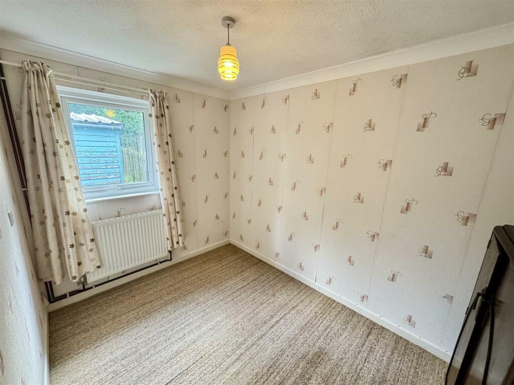 REAR BEDROOM