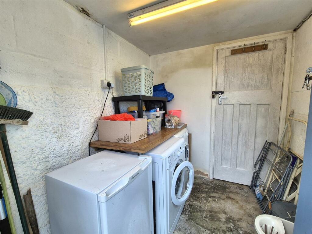Utility and outside storeroom.jpg